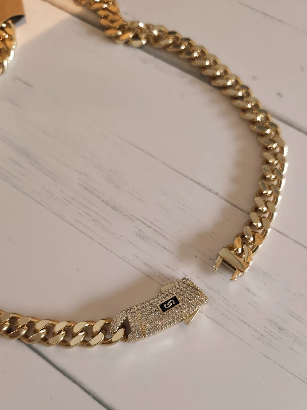 The surface is plated with a thin layer of real gold 14k.